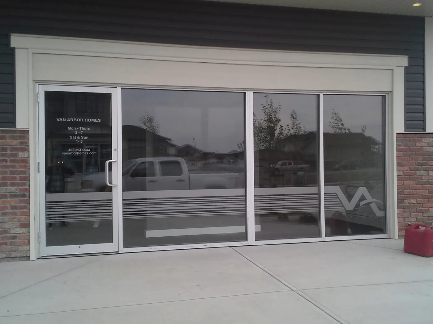 Frosted vinyl strips on storefront glass