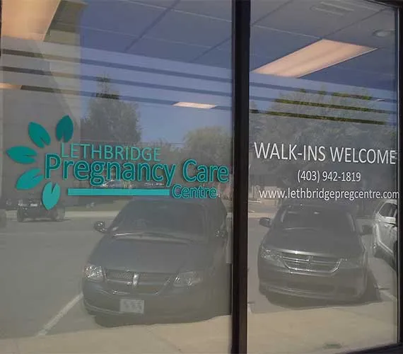 Cut vinyl logo and text on a clinic window