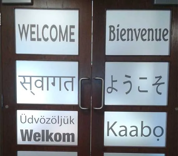 Frosted window film with welcome in several languages