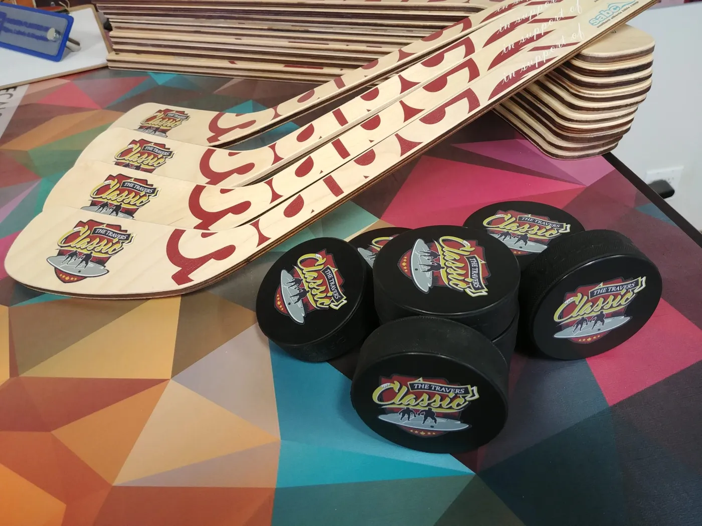 Custom printed hockey pucks and mini sticks